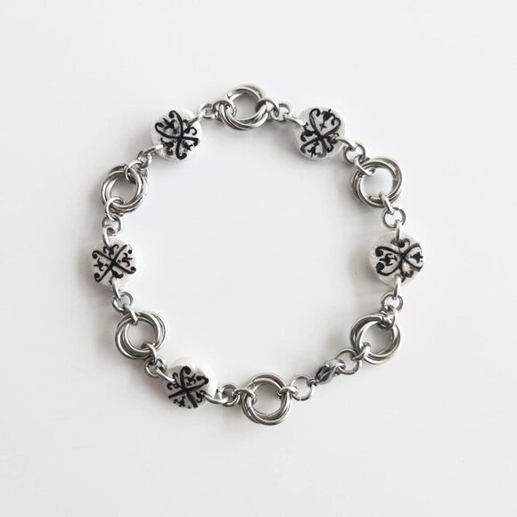 Iridescent victorian gothic and mobius rose silver charm bracelet - Picture 1 of 8